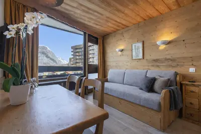 Coin salon dans l'établissement Appartement central ski et commerces à pied - Val d'Isère