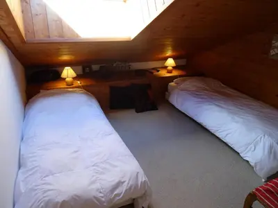 Un ou plusieurs lits dans un hébergement de l'établissement Chalet Epilobes - Chalet de charme 10 personnes à Vallandry MAE-3903
