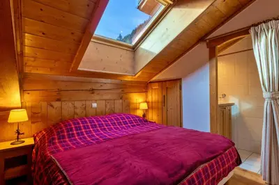 Un ou plusieurs lits dans un hébergement de l'établissement Capella - Spa, Calme & Vue Montagne