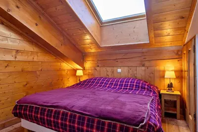 Un ou plusieurs lits dans un hébergement de l'établissement Capella - Spa, Calme & Vue Montagne