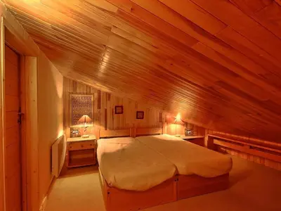 Un ou plusieurs lits dans un hébergement de l'établissement Spacieux duplex 8 pers au pied des pistes à Belle Plagne - FR-1-455-285