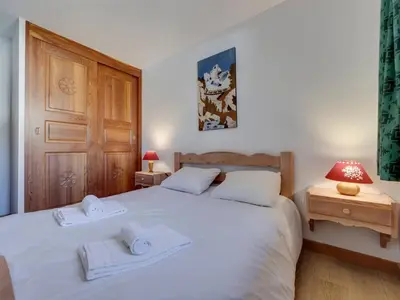 Un ou plusieurs lits dans un hébergement de l'établissement Appartement ski aux pieds, 3 chambres, balcon, parking inclus - FR-1-862-6