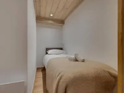 Un ou plusieurs lits dans un hébergement de l'établissement Duplex rénové à Val-d'Isère, confortable, 7 pers. - FR-1-862-16