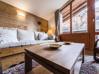 Coin salon dans l'établissement Appartement rénové 5 pers. au pied des pistes avec Wifi - FR-1-862-32
