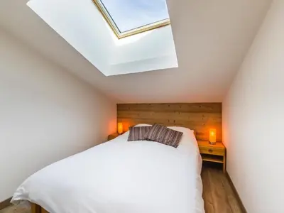 Un ou plusieurs lits dans un hébergement de l'établissement Appartement rénové 5 pers. au pied des pistes avec Wifi - FR-1-862-32