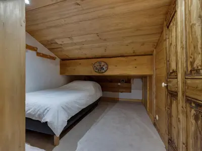 Un ou plusieurs lits dans un hébergement de l'établissement Duplex confortable 5 pers. ski aux pieds, balcon Val-d'Isère - FR-1-862-34