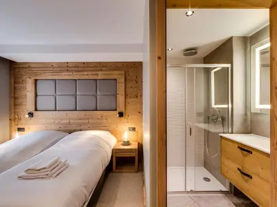 Un ou plusieurs lits dans un hébergement de l'établissement Appartement rénové proche pistes, 3 chambres, parking couvert - FR-1-862-10