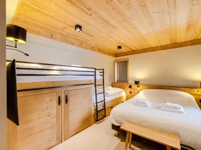 Un ou plusieurs lits dans un hébergement de l'établissement Appartement rénové proche pistes, 3 chambres, parking couvert - FR-1-862-10