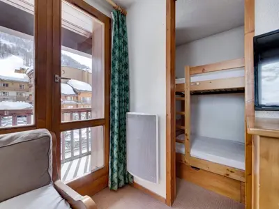 Un ou plusieurs lits dans un hébergement de l'établissement Appartement 4 pers au pied des pistes avec balcon, Val-d'Isère - FR-1-862-46