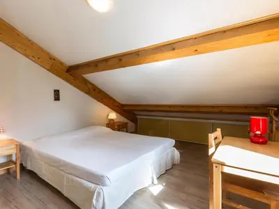 Un ou plusieurs lits dans un hébergement de l'établissement Duplex confortable 3 chambres, proche pistes et commerces - FR-1-862-21