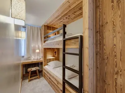 Un ou plusieurs lits dans un hébergement de l'établissement Appartement rénové au village, 4 pers, proche des remontées mécaniques - FR-1-862-62