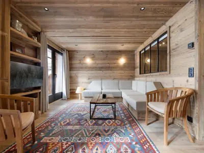 Coin salon dans l'établissement Appartement lumineux Ski aux pieds avec Parking - FR-1-862-41