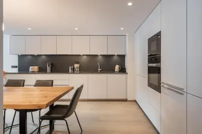 Cuisine ou kitchenette dans l'établissement Apartment Onyx Val d'Isère - by EMERALD STAY