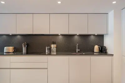 Cuisine ou kitchenette dans l'établissement Apartment Onyx Val d'Isère - by EMERALD STAY