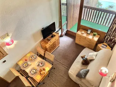 Coin salon dans l'établissement Studio mezzanine à Val d'Isère pour 3 pers. avec animaux & parking couvert - FR-1-411-1019