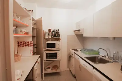 Cuisine ou kitchenette dans l'établissement Iseran 804 appartement cosy avec vue