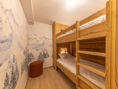 Un ou plusieurs lits dans un hébergement de l'établissement Appartement standing avec cheminée, terrasse et accès détente - FR-1-694-444