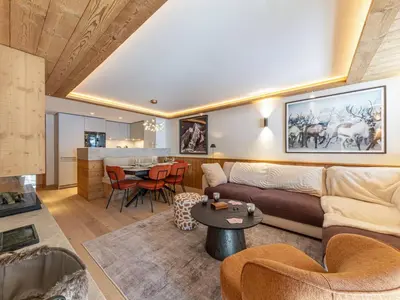 Coin salon dans l'établissement Appartement standing avec cheminée, terrasse et accès détente - FR-1-694-444