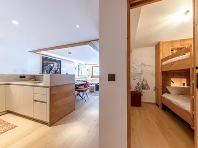 Un ou plusieurs lits dans un hébergement de l'établissement Appartement standing avec cheminée, terrasse et accès détente - FR-1-694-444
