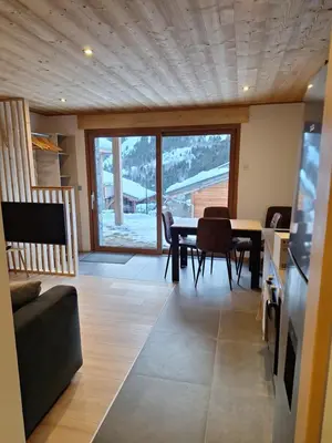 Coin salon dans l'établissement Appartement 4 personnes proche des pistes de ski