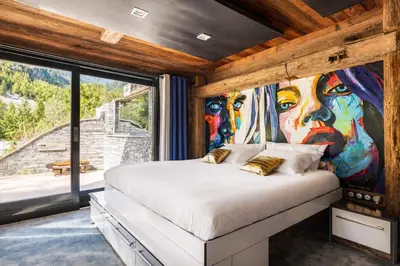 Un ou plusieurs lits dans un hébergement de l'établissement SmartStay Chalet Quezac Tignes