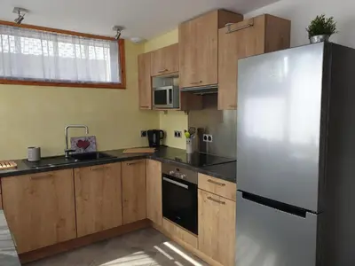 Cuisine ou kitchenette dans l'établissement Ski aux pieds, Paradiski, appart 4 6p confort