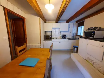 Cuisine ou kitchenette dans l'établissement Au coeur du village Val Cenis Bramans