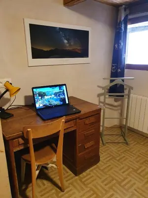 Télévision ou salle de divertissement dans l'établissement Au coeur du village Val Cenis Bramans
