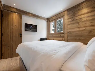 Un ou plusieurs lits dans un hébergement de l'établissement Appartement 2 Chambres, Proche Pistes, Parking Couvert - FR-1-862-47