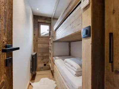 Un ou plusieurs lits dans un hébergement de l'établissement Appartement 2 Chambres, Proche Pistes, Parking Couvert - FR-1-862-47