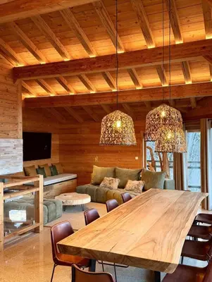 Télévision ou salle de divertissement dans l'établissement Chalets Pierra Menta & Mont d'Argent