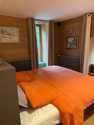 Un ou plusieurs lits dans un hébergement de l'établissement Apartment - fireplace & terrace - 2 min to slopes