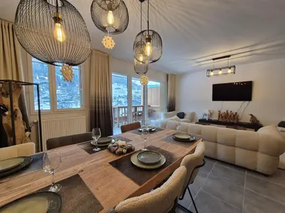 Coin salon dans l'établissement Sublime appartement 10pers - St Foy village