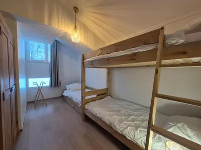Un ou plusieurs lits dans un hébergement de l'établissement Sublime appartement 10pers - St Foy village