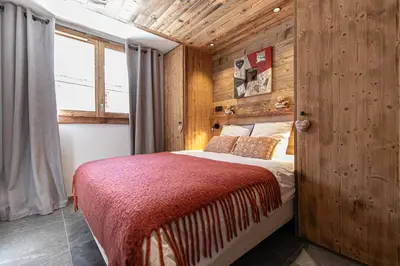 Un ou plusieurs lits dans un hébergement de l'établissement Marmotton 103 - Duplex avec terrasse et sauna à coté des pistes