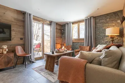 Coin salon dans l'établissement Marmotton 103 - Duplex avec terrasse et sauna à coté des pistes