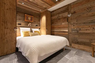 Un ou plusieurs lits dans un hébergement de l'établissement Marmotton 103 - Duplex avec terrasse et sauna à coté des pistes