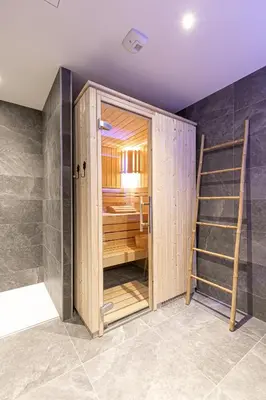 Un ou plusieurs lits dans un hébergement de l'établissement Marmotton 103 - Duplex avec terrasse et sauna à coté des pistes
