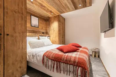Un ou plusieurs lits dans un hébergement de l'établissement Marmotton 102 - Duplex à coté des pistes