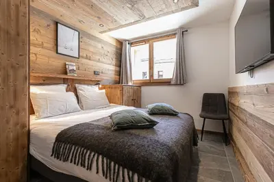 Un ou plusieurs lits dans un hébergement de l'établissement Marmotton 102 - Duplex à coté des pistes