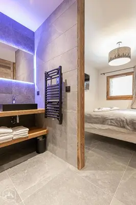 Un ou plusieurs lits dans un hébergement de l'établissement Marmotton 101 - Duplex à coté des pistes