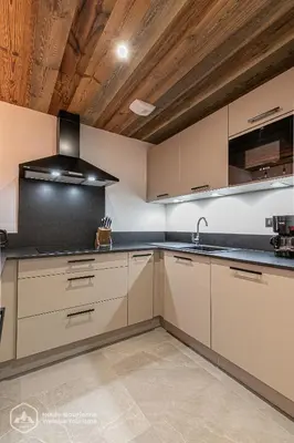 Cuisine ou kitchenette dans l'établissement Marmotte RDJ01 - Appartement neuf en face du télésiège