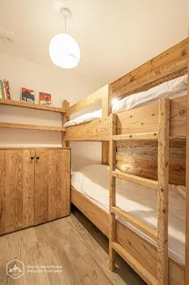 Un ou plusieurs lits dans un hébergement de l'établissement Résidence la Marmotte - La Trace - Appartement neuf en face du télésiège