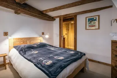 Un ou plusieurs lits dans un hébergement de l'établissement Chalet La Pommeraie - OVO Network