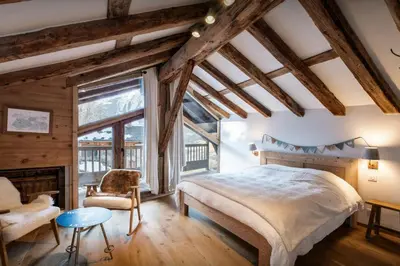 Un ou plusieurs lits dans un hébergement de l'établissement Chalet La Pommeraie - OVO Network