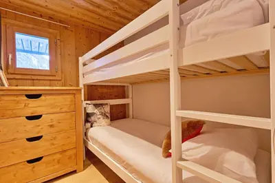 Un ou plusieurs lits dans un hébergement de l'établissement Inversens superbe chalet vue montagne