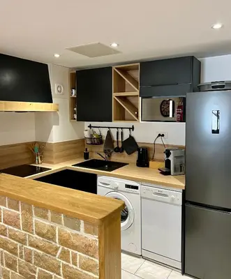 Cuisine ou kitchenette dans l'établissement Maisonnette au cœur de la Vanoise