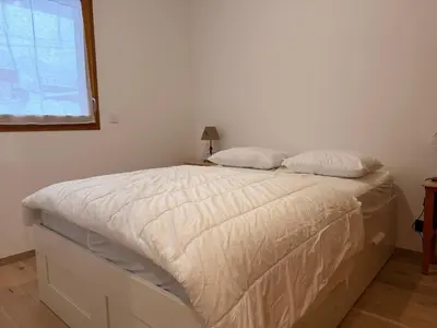 Un ou plusieurs lits dans un hébergement de l'établissement Charmant Appartement avec Grande Terrasse ouest, 2P - 6 Pers. - FR-1-464-264