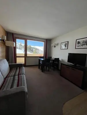 Un ou plusieurs lits dans un hébergement de l'établissement Belle Plagne Le QUARTZ Ski aux pieds