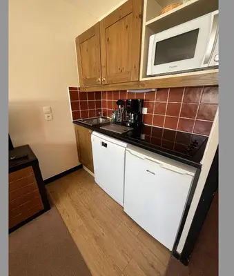 Cuisine ou kitchenette dans l'établissement Belle Plagne Le QUARTZ Ski aux pieds